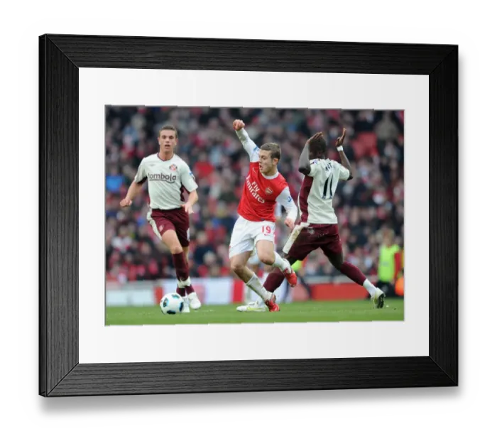 Framed Print : Jack Wilshere (Arsenal) Sulley Muntari (Sunderland). Arsenal 0: 0 Sunderland