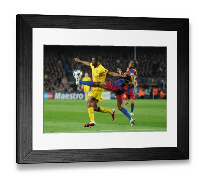 Framed Print : Abou Diaby (Arsenal) Eric Abidal (Barcelona). Barcelona 3: 1 Arsenal. UEFA Champions League Framed Print : Abou Diaby (Arsenal) Eric Abidal (Barcelona). Barcelona 3: 1 Arsenal. UEFA Champions League