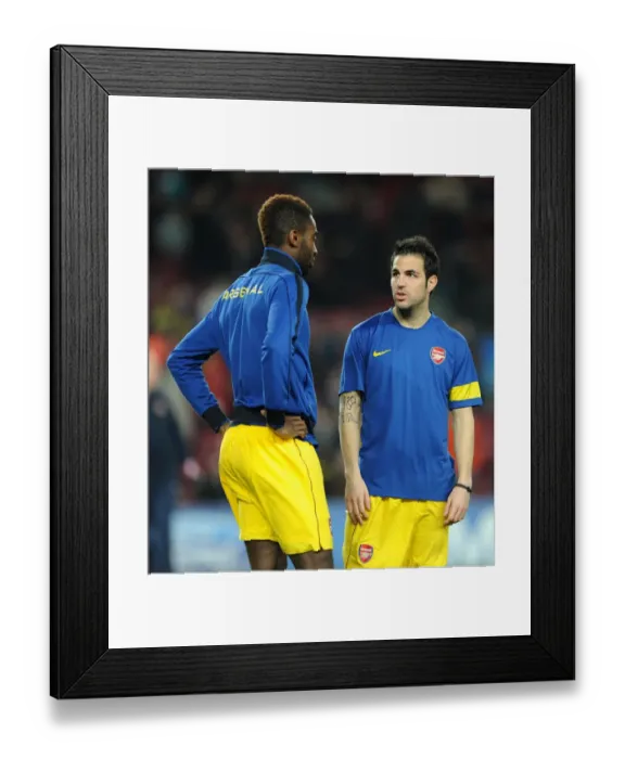 Framed Print : Cesc Fabregas chats to Johan Djourou (Arsenal) before the match. Barcelona 3: 1 Arsenal