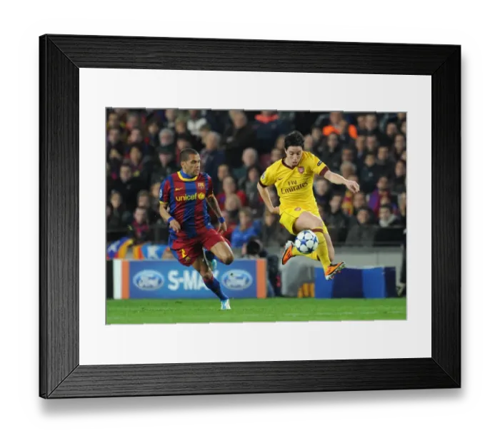 Framed Print : Champions Clash: Nasri vs. Alves in Barcelona's 3:1 UEFA Champions League Victory over Arsenal