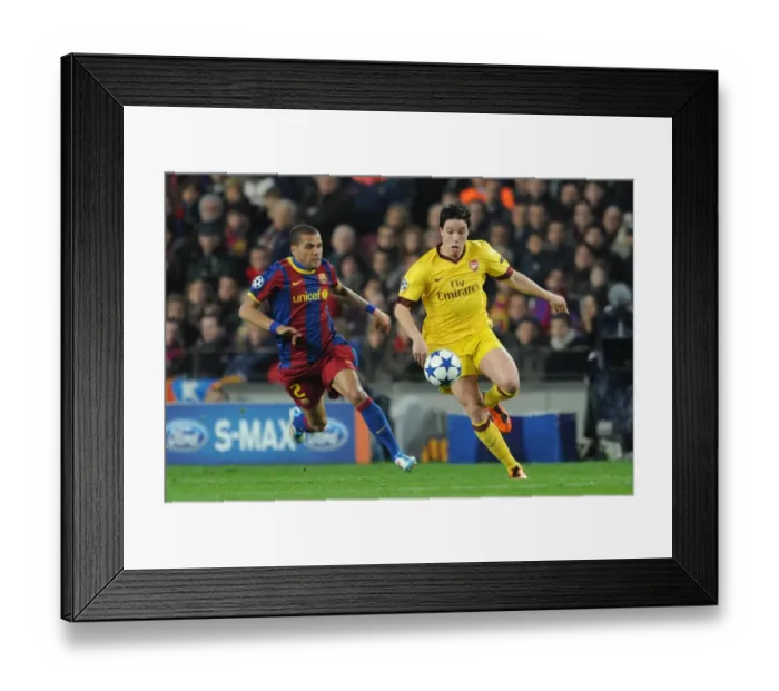 Framed Print : Samir Nasri (Arsenal) Daniel Alves (Barcelona). Barcelona 3: 1 Arsenal. UEFA Champions League