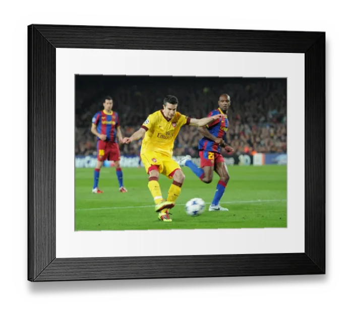 Framed Print : Robin van Persie (Arsenal) shoots for goal after the referee has blown his whistle earning a 2nd yellow card. Barcelona 3: 1 Arsenal. UEFA Champions League. Last 16, 2nd leg. Camp Nou, Barcelona, 8  /  3  /  11. Credit : Arsenal Football Club  / 