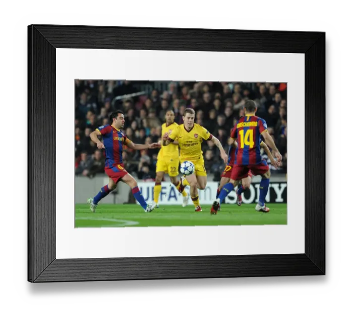 Framed Print : Jack WIlshere (Arsenal) Xavi (Barcelona). Barcelona 3: 1 Arsenal. UEFA Champions League