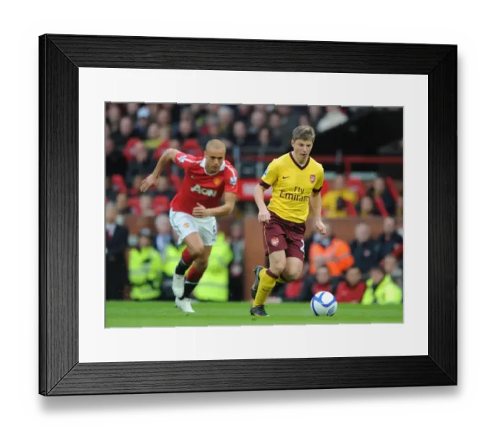 Framed Print : Andrey Arshavin (Arsenal) Wes Brown (Man United). Manchester United 2: 0 Arsenal Framed Print : Andrey Arshavin (Arsenal) Wes Brown (Man United). Manchester United 2: 0 Arsenal