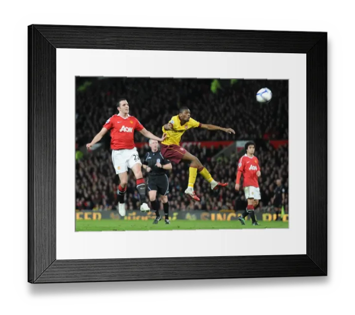 Framed Print : Abou Diaby (Arsenal) John O Shea (Manchester United). Manchester United 2: 0 Arsenal Framed Print : Abou Diaby (Arsenal) John O Shea (Manchester United). Manchester United 2: 0 Arsenal