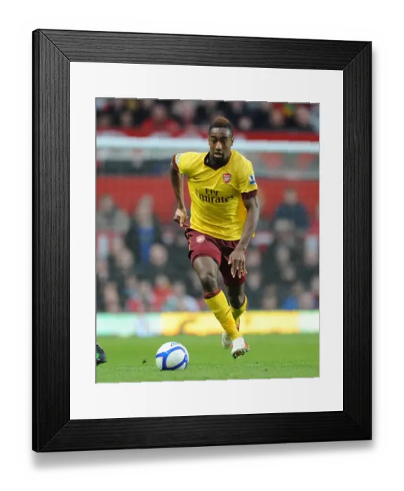 Framed Print : Manchester United's Triumph over Arsenal in FA Cup Sixth Round: Johan Djourou's Defeat at Old Trafford (2010)