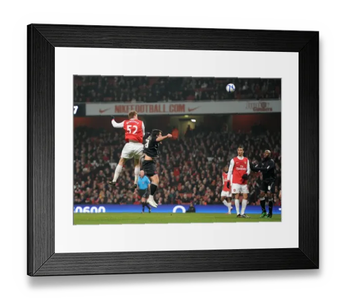 Framed Print : Nicklas Bendtner scores his 1st goal, Arsenals 2nd, under pressure from Charlie Daniels