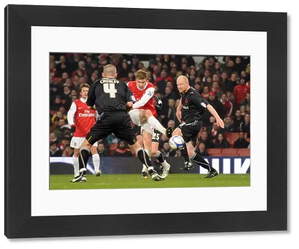 Nicklas Bendtner scores his 2nd goal, Arsenals rd, under pressure from Andrew Whing