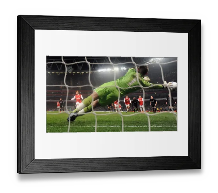 Framed Print : Nicklas Bendtner scores his 3rd goal, Arsenals 4th, past Jamie Jones