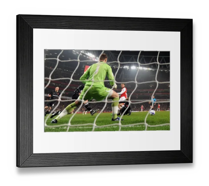 Framed Print : Marouane Chamakh cscores Arsenals 1st goal past Jamie Jones (Orient) Framed Print : Marouane Chamakh cscores Arsenals 1st goal past Jamie Jones (Orient)