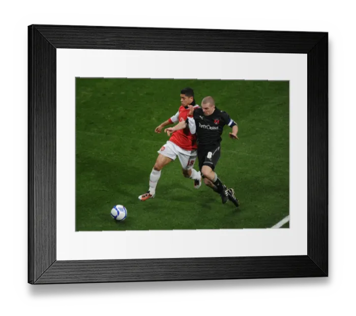 Framed Print : Denilson (Arsenal) Stephen Dawson (Orient). Arsenal 5: 0 Leyton Orient, FA Cup Fifth Round Replay