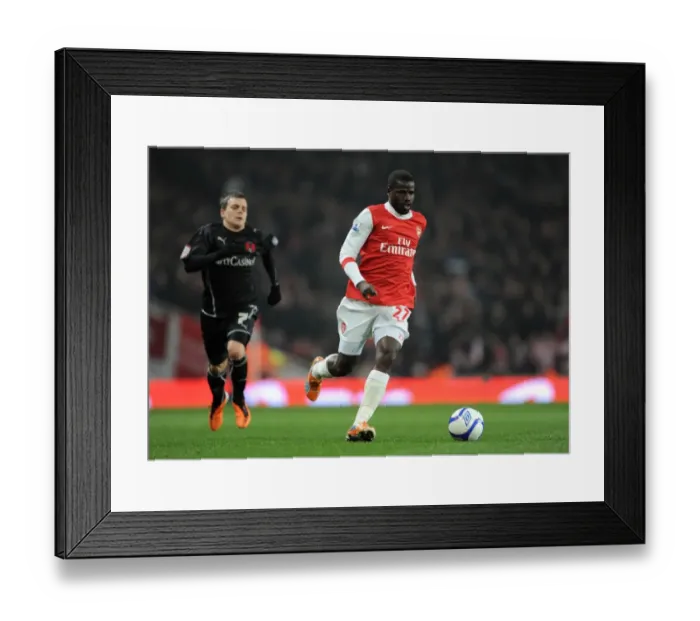 Framed Print : Emmanuel Eboue (Arsenal) Dean Cox (Orient). Arsenal 5: 0 Leyton Orient. FA Cup 5th Round Replay