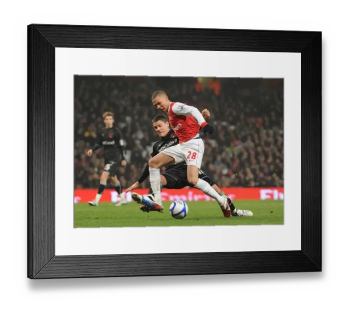 Framed Print : Arsenal's Kieran Gibbs Felled by Orients Alex Revell: FA Cup Penalty Decided at Emirates Stadium Framed Print : Arsenal's Kieran Gibbs Felled by Orients Alex Revell: FA Cup Penalty Decided at Emirates Stadium