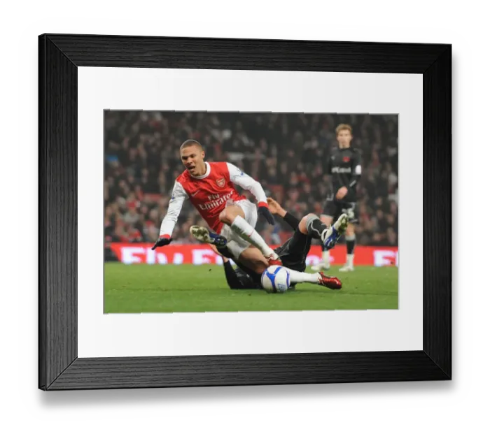 Framed Print : Kieran Gibbs is tripped for the Arsenla penalty buy Orients Alex Revell