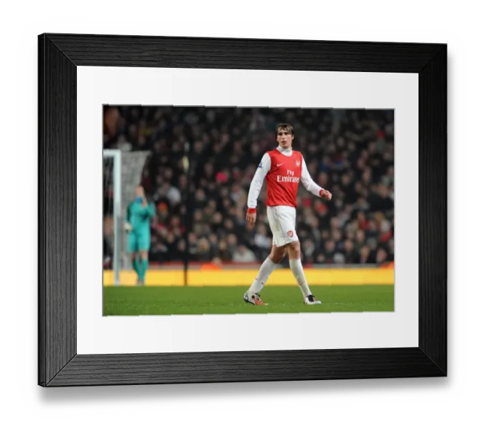 Framed Print : Arsenal's Ignasi Miquel Leads the Charge in FA Cup Victory over Leyton Orient (5-0)