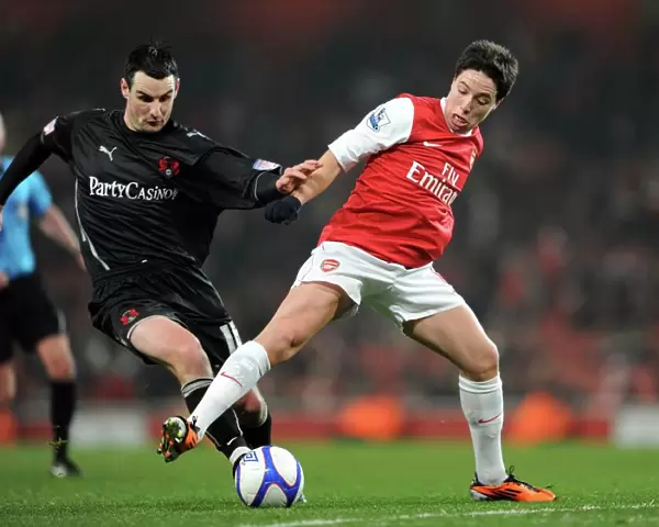 Samir Nasri (Arsenal) Matthew Spring (Orient). Arsenal 5: 0 Leyton Orient