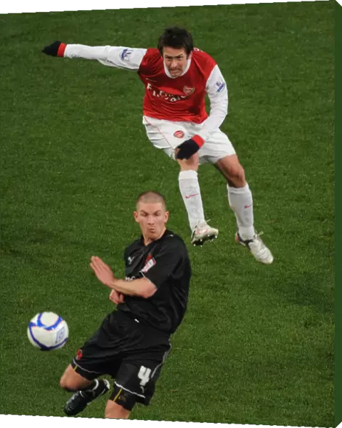Tomas Rosicky (Arsenal) Ben Chorley (Orient). Arsenal 5: 0 Leyton Orient