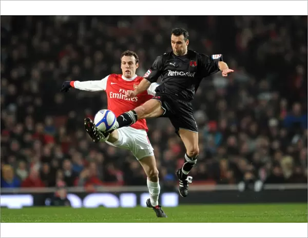Sebastien Squillaci (Arsenal) Scott McGleish (Orient). Arsenal 5: 0 Leyton Orient