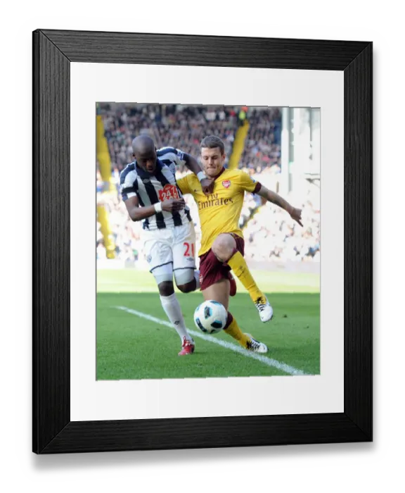 Framed Print : Wilshere vs. Mulumbu: The Thrilling Stalemate at The Hawthorns, Arsenal vs. West Bromwich Albion, Premier League, 2011 Framed Print : Wilshere vs. Mulumbu: The Thrilling Stalemate at The Hawthorns, Arsenal vs. West Bromwich Albion, Premier League, 2011