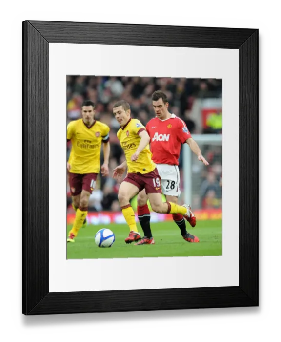 Framed Print : Jack Wilshere (Arsenal) Darron Gibson (Man Utd). Manchester United 2: 0 Arsenal