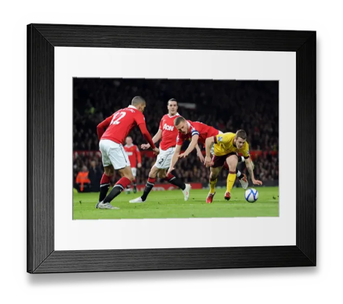 Framed Print : Jack Wilshere (Arsenal) Nemanja Vidic and Chris Smalling (Man Utd). Manchester United 2