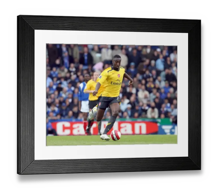 Framed Print : Johan Djourou: Arsenal's Unyielding Defender at Portsmouth's Fratton Park