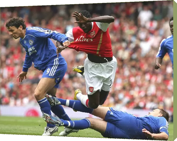 Emmanuel Adebayor (Arsenal) John Terry and Khalid Boulahrouz (Chelsea)
