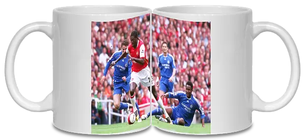 Emmanuel Adebayor (Arsenal) Kahlid Boularhouz and Jon Obe Mikel (Chelsea)