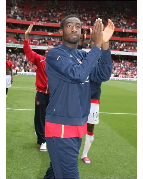 Johan Djourou (Arsenal) waves to the fans after the match