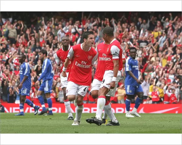 Gilberto celebrates scoring the Arsenal goal with Cesc Fabregas