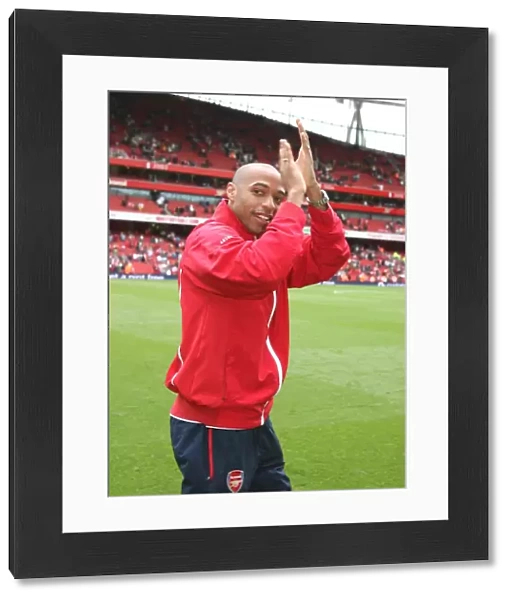 Thierry Henry waves to the Arsenal fans before the match