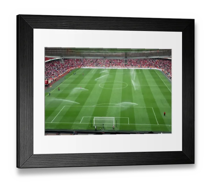 Framed Print : The sprinklers water the pitch at half time