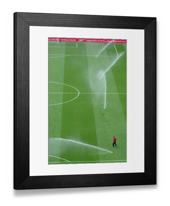 Framed Print : Half Time at Emirates: Arsenal and Chelsea Square Off as Sprinklers Refresh the Pitch Framed Print : Half Time at Emirates: Arsenal and Chelsea Square Off as Sprinklers Refresh the Pitch