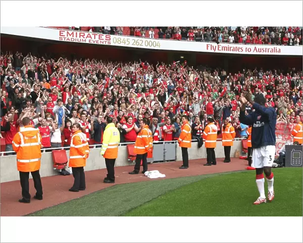 Kolo Toure waves to the Bergkamp Gallery after the match