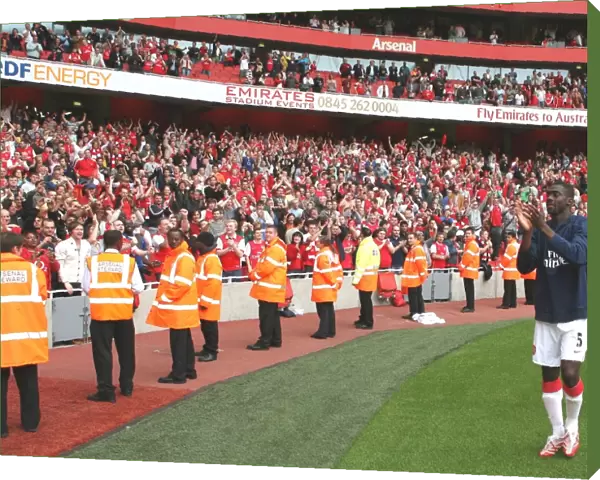 Kolo Toure waves to the Arsenal fans after the match