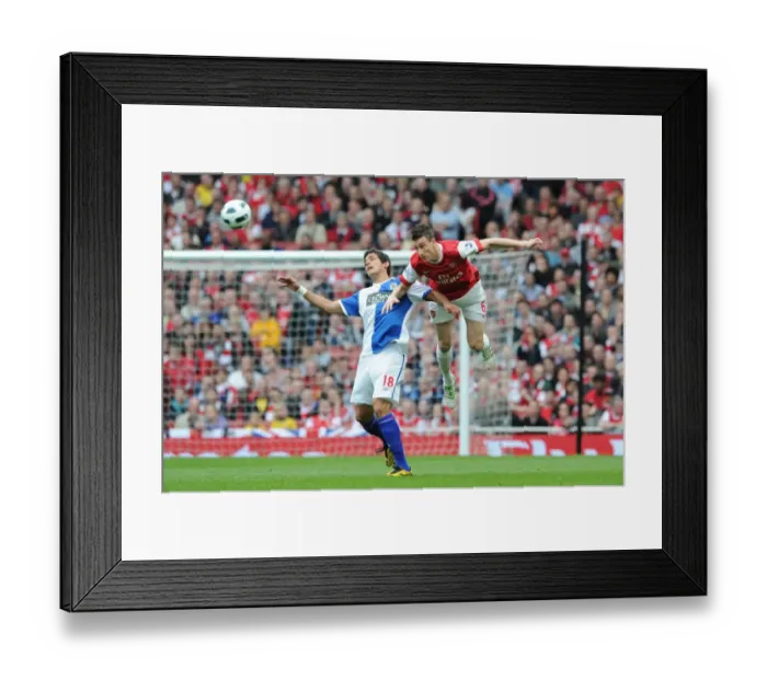 Framed Print : Laurent Koscielny (Arsenal) Roque Santa Cruz (Blackburn). Arsenal 0: 0 Blackburn Rovers