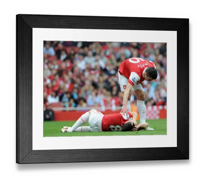 Framed Print : Samir Nasri injured on the floor as Robin van Persie (Arsenal) checks on him Framed Print : Samir Nasri injured on the floor as Robin van Persie (Arsenal) checks on him