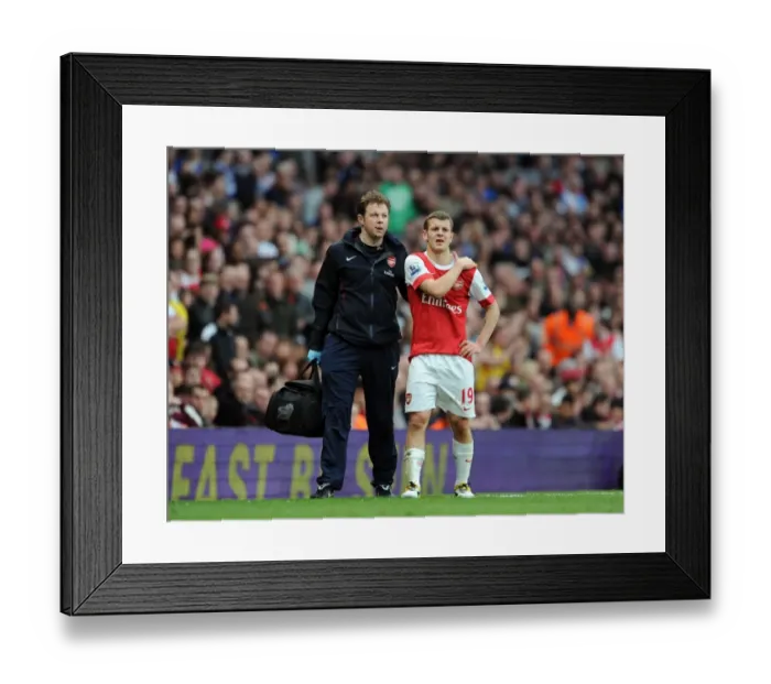 Framed Print : Colin Lewin the Arsenal Physio and Jack Wilshere (Arsenal). Arsenal 0: 0 Blackburn Rovers
