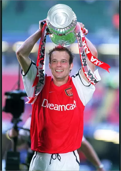 Arsenal goalscorer Fredrik Ljungberg with the FA Cup after the match