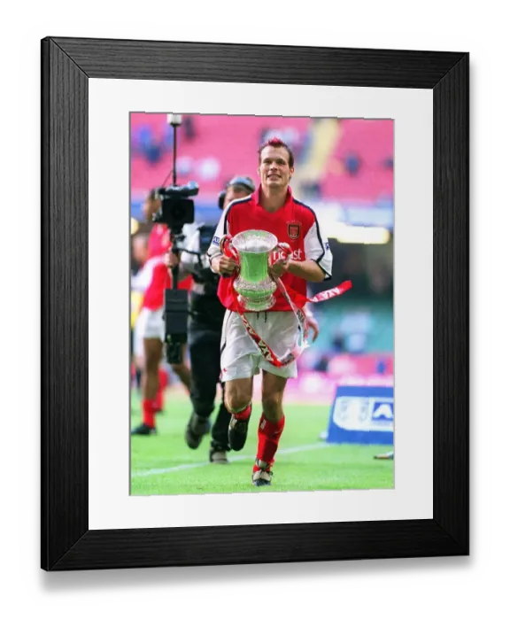 Framed Print : Arsenal's Fredrik Ljungberg Lifts FA Cup after Arsenal's 2:0 Victory over Chelsea, The AXA FA Cup Final, Millennium Stadium, Cardiff, Wales, 2002 Framed Print : Arsenal's Fredrik Ljungberg Lifts FA Cup after Arsenal's 2:0 Victory over Chelsea, The AXA FA Cup Final, Millennium Stadium, Cardiff, Wales, 2002