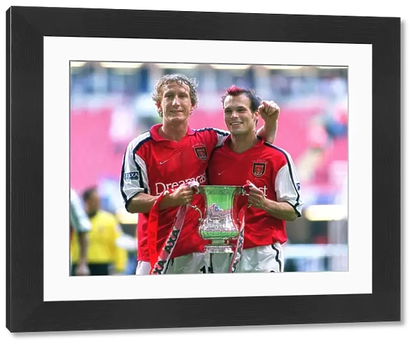 Arsenal goalscorers Ray Parlour and Fredrik Ljungberg with the F. A