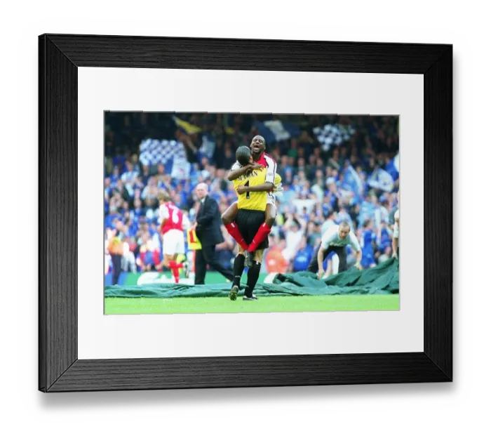 Framed Print : Victory for Vieira and Seaman: Arsenal's FA Cup Double Triumph over Chelsea (4 / 5 / 2002 - The Millennium Stadium, Cardiff, Wales) Framed Print : Victory for Vieira and Seaman: Arsenal's FA Cup Double Triumph over Chelsea (4 / 5 / 2002 - The Millennium Stadium, Cardiff, Wales)