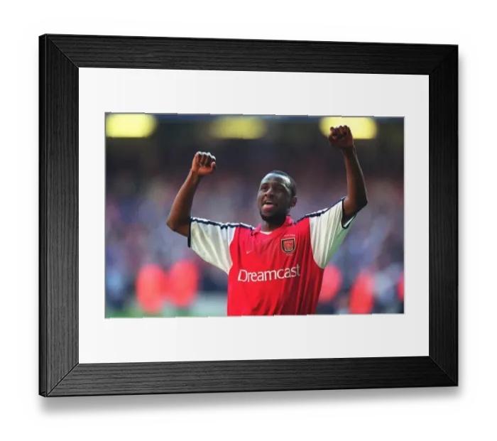 Framed Print : Patrick Vieira's Triumph: Arsenal's Historic Win over Manchester United at Old Trafford, 2002 (FA Barclaycard Premiership) Framed Print : Patrick Vieira's Triumph: Arsenal's Historic Win over Manchester United at Old Trafford, 2002 (FA Barclaycard Premiership)