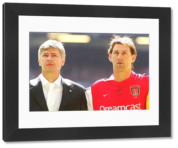 Arsenal manager Arsene Wenger with captain Tony Adams before the match
