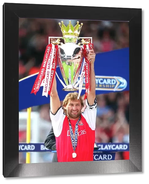 Arsenal captain Tony Adams with the F. A. Barclaycard Premiership Trophy