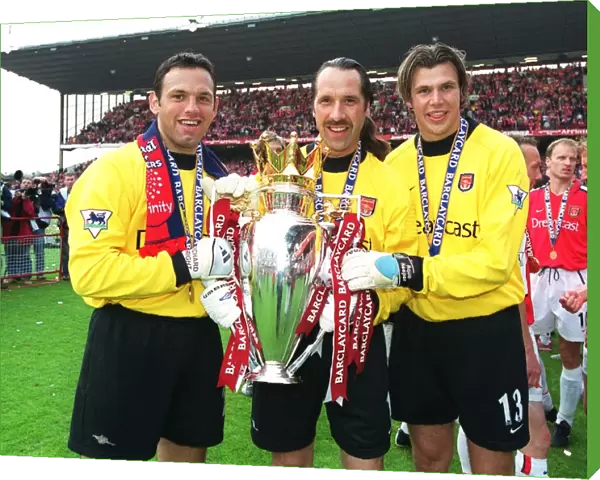 Arsenal goalkeepers Richard Wright, David Seaman and Stuart Taylor lift the F. A