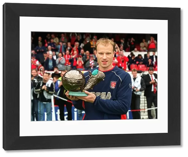Dennis Bergkamp with the ITV goal of the season award (for his goal against Newcastle United in the