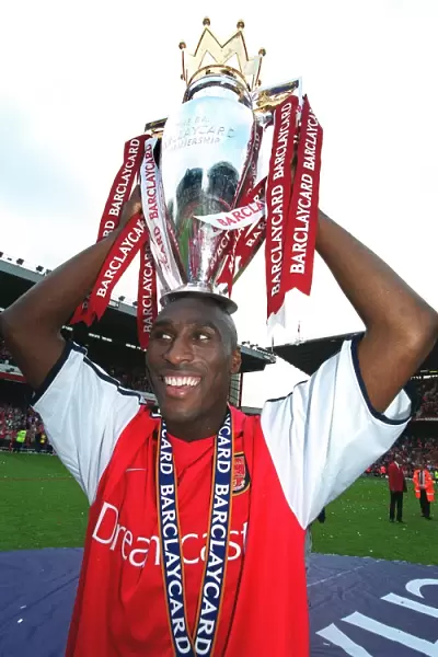 Sol Campbell with the F. A. Barclaycard Premiership Trophy
