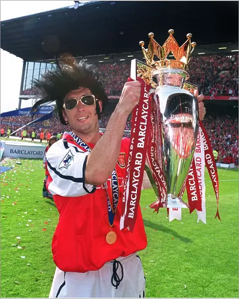 Gilles Grimandi with the F. A. Barclaycard Premiership Trophy