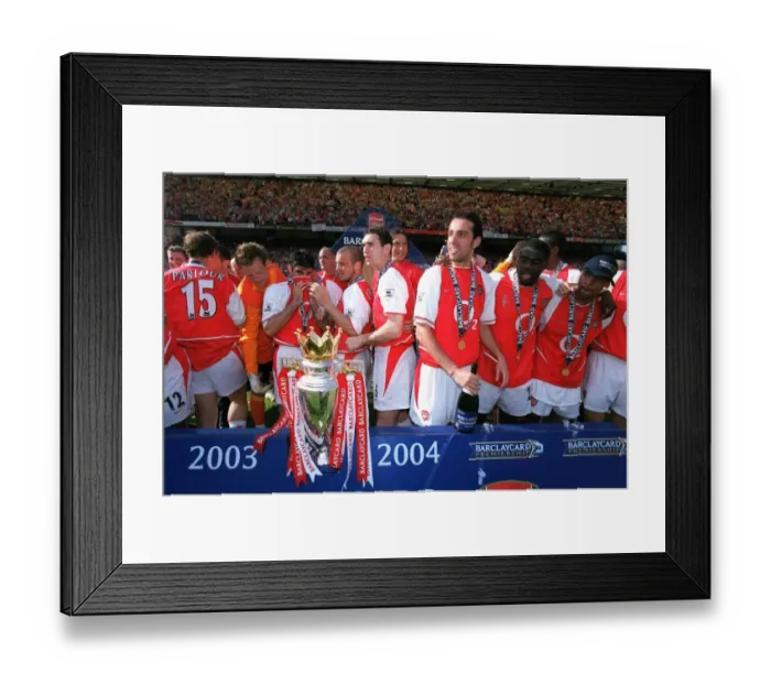 Framed Print : The Arsenal Players celebrate with the Premiership trophy Framed Print : The Arsenal Players celebrate with the Premiership trophy